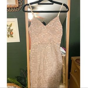 Size M body on dress. NWT and the perfect amount of sparkle.